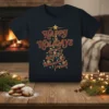 Happy Holidays text with a Christmas tree design featuring lights and ribbon on a dark t-shirt