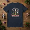 Happy Holidays From The Merry Puffin And A Fishy New Year text on a navy t-shirt with three puffins wearing