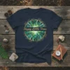 Happy Little Trees t-shirt design featuring a watercolor forest canopy viewed from below, surrounded by a circular frame of branches