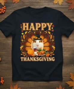 Happy Thanksgiving text with a cute guinea pig wearing a top hat, surrounded by turkey feathers, pumpkin, and a mini