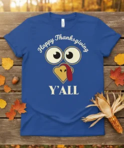 Happy Thanksgiving Y'ALL turkey face graphic tee, featuring cartoon eyes and wattle, blue shirt