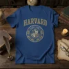 Harvard University vintage crest t-shirt with gold lettering and shield emblem on a blue shirt