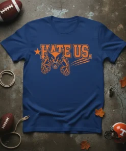 Blue t-shirt with orange text "Hate Us." and a fierce bobcat mascot graphic
