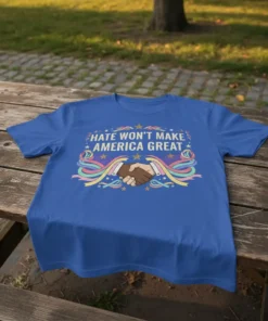 Blue t-shirt with "Hate Won't Make America Great" text and diverse handshake graphic