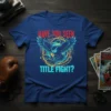 Blue t-shirt with "HAVE YOU SEEN TITLE FIGHT?" text and a graphic of an owl in flight, surrounded by circular