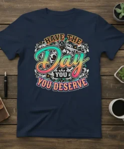 Have The Day You Deserve quote t-shirt with vibrant, gradient typography and floral mandala background design