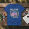 Have The Day You Voted For quote with floral and rainbow graphic on a royal blue t-shirt