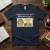 T-shirt featuring the quote "Having fun isn't hard When you've got a LIBRARY CARD" with a graphic of a library
