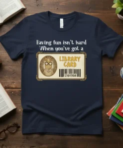 T-shirt featuring the quote "Having fun isn't hard When you've got a LIBRARY CARD" with a graphic of a library