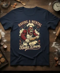 T-shirt with "HAVING A MENTAL Bake Down" text and a muscular gorilla wearing a chef's hat and apron, rolling dough