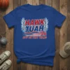 Hawk Tuah '24 Spit On That Thang text design with wings and American flag elements on a royal blue t-shirt