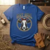 Hay Girl t-shirt design with a cow wearing a red bandana inside a rope circle, presented on a blue shirt