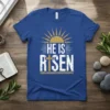 He Is Risen Christian Easter T-Shirt with sun graphic and cross, royal blue