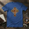 Blue t-shirt with "HE IS RISEN" text in gold and red ornate cross graphic, representing Easter and Christian faith