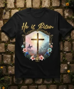He is Risen Christian T-Shirt featuring a golden cross, a silhouette of a rider on a donkey, and floral accents