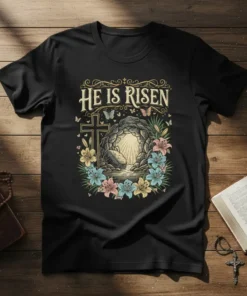 He Is Risen Christian Easter T-Shirt with empty tomb, cross, lilies, and butterflies graphic