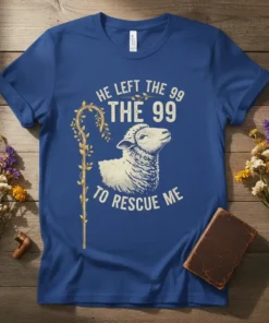 Christian t-shirt with "He Left The 99 The 99 To Rescue Me" text and a sheep graphic, designed for faith-based