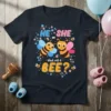 HE OR SHE What will it BEE? gender reveal party t-shirt design with cute bees and floral accents