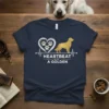 Heartbeat of a Golden T-Shirt with golden retriever graphic and paw prints in a heart, on a navy blue tee