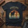 Heartland t-shirt with vintage sunset, horse silhouette, and cowgirl rider graphic
