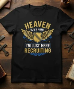 T-shirt with "Heaven Is My Home I'm Just Here Recruiting" text and winged shield graphic
