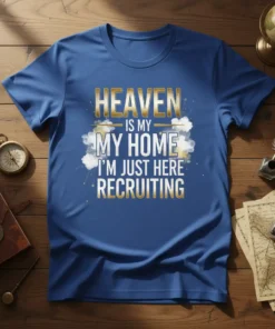 HEAVEN IS MY MY HOME I'M JUST HERE RECRUITING text on a blue t-shirt with gold and white cloud graphics