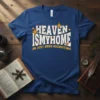 HEAVEN ISMYHOME IM JUST HERE RECRUITING text design on a blue t-shirt with retro star accents