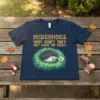 Hedgehogs Why Don't They Just Share The Hedge? quote with a cute hedgehog in a bush on a navy t-shirt