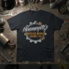 Heemeyer's Muffler Repair Granby,CO text inside a gear graphic on a black t-shirt, featuring wrenches and automotive theme