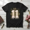T-shirt with "hello 11 EST. 2014" in elegant gold font, featuring decorative elements and a marble-like number 11