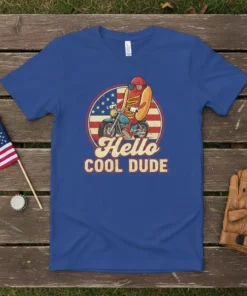 Hello COOL DUDE t-shirt design with a cartoon hot dog riding a motorcycle against an American flag circle