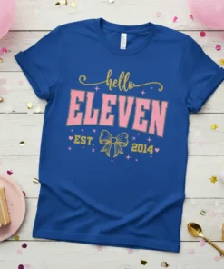 Hello ELEVEN EST. 2014 birthday t-shirt with pink and gold glitter text and a bow graphic