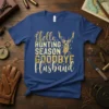 Hello Hunting Season Goodbye Husband text with a golden deer graphic on a navy blue t-shirt