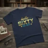 Hello SIXTY Est. 1966 t-shirt design with gold and blue text and heart accents