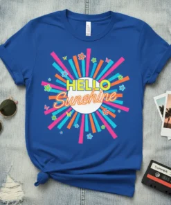 Hello Sunshine text with retro sunburst graphic and colorful flowers and butterflies on a royal blue t-shirt