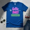 Blue t-shirt with neon pink and green text reading "hello SWEET CHEEKS", featuring stars and eyelashes graphics