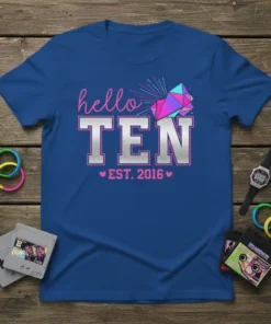 Hello TEN EST. 2016 text with colorful geometric crystals on a royal blue t-shirt, perfect for a 10th birthday celebration