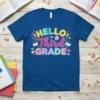 Hello Third Grade back to school t-shirt with colorful text and fun school graphics like rockets and books