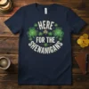 Navy blue t-shirt with "HERE FOR THE SHENANIGANS" text and shamrock graphics for St. Patrick's Day