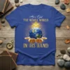 Christian t-shirt design with gold text "He's Got The Whole World In His Hand" and imagery of hands holding Earth