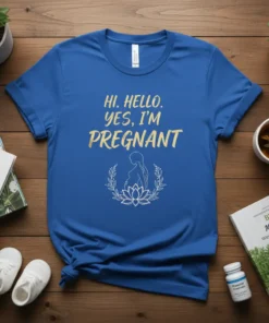 Blue t-shirt with "HI. HELLO. YES, I'M PREGNANT" in gold lettering and a pregnant silhouette in a floral wreath