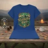 Hillbilly Ball t-shirt design with rustic cabin, mountains, antlers, and moon graphic