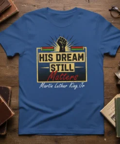 His Dream Still Matters T-Shirt with Martin Luther King Jr. quote and raised fist graphic