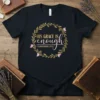 Christian t-shirt with gold wreath and pink butterflies, featuring "His Grace Is Enough" and "2 Corinthians 12:9" text