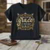Christian t-shirt with elegant gold script reading "His Grace Is Enough" surrounded by ornate scrollwork and doves
