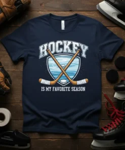 Hockey Is My Favorite Season t-shirt design with crossed hockey sticks and puck on ice background
