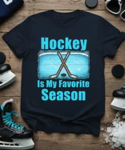 Hockey Is My Favorite Season quote with ice rink graphic and crossed sticks on a navy t-shirt