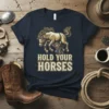 Hold Your Horses t-shirt with cowboy and bucking horse graphic, vintage distressed font