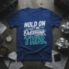 T-shirt with "HOLD ON LET ME OVERTHINK THIS." text in white and neon blue, featuring circuit board design elements
