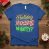 Blue t-shirt with "Holiday HOOBIE WHATTY?" text in festive fonts and colors, surrounded by fireworks and gift graphics